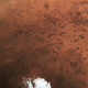 Illustration for article titled Here Is a Rare View of Mars' Icy Backside